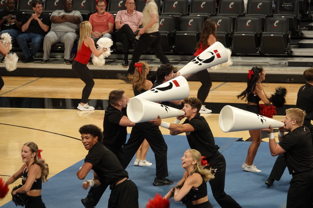 UC cheerleaders perform at Fifth Third Arena.