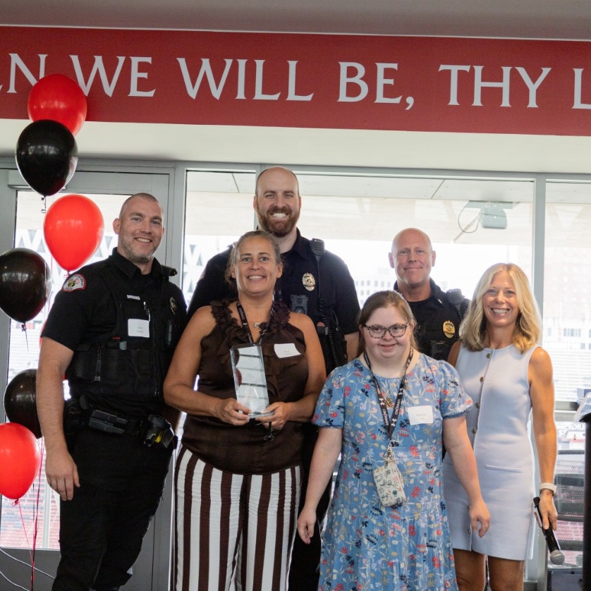 UC Public Safety accepting an award from IDD Ed Center. 