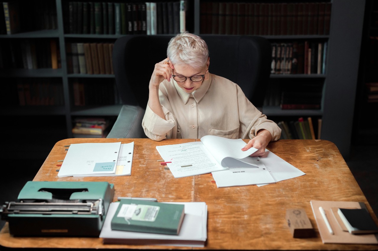 woman studying at table