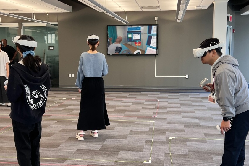 Students immersed in a VR simulation