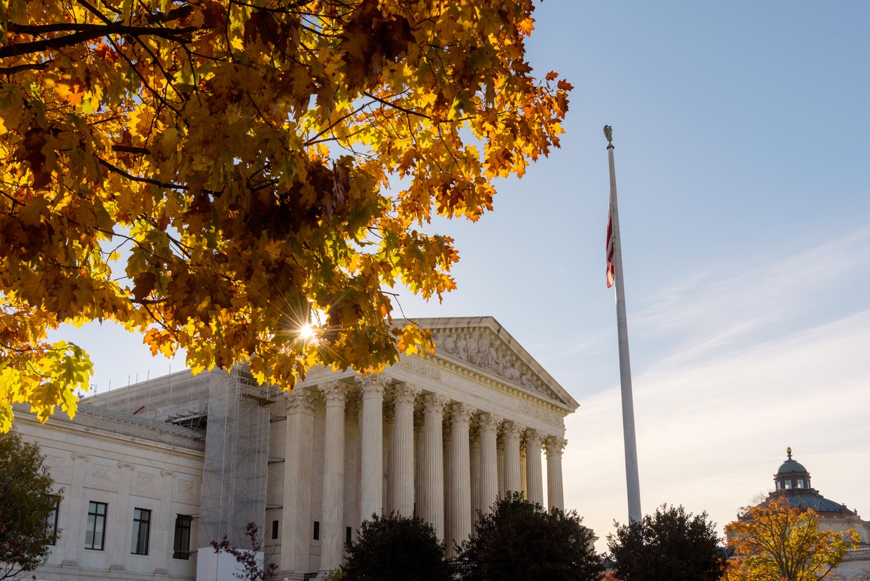 Exterior of the US Supreme Court, surrounded by fall leaves