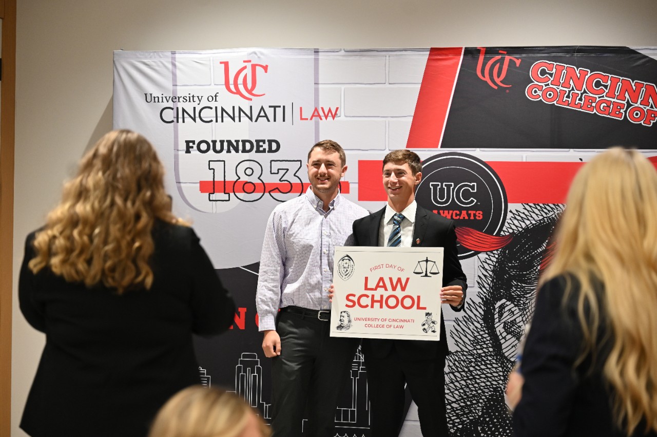 A member of the Class of 2025 takes a photo with family and friends. | photo: Joey Yerace
