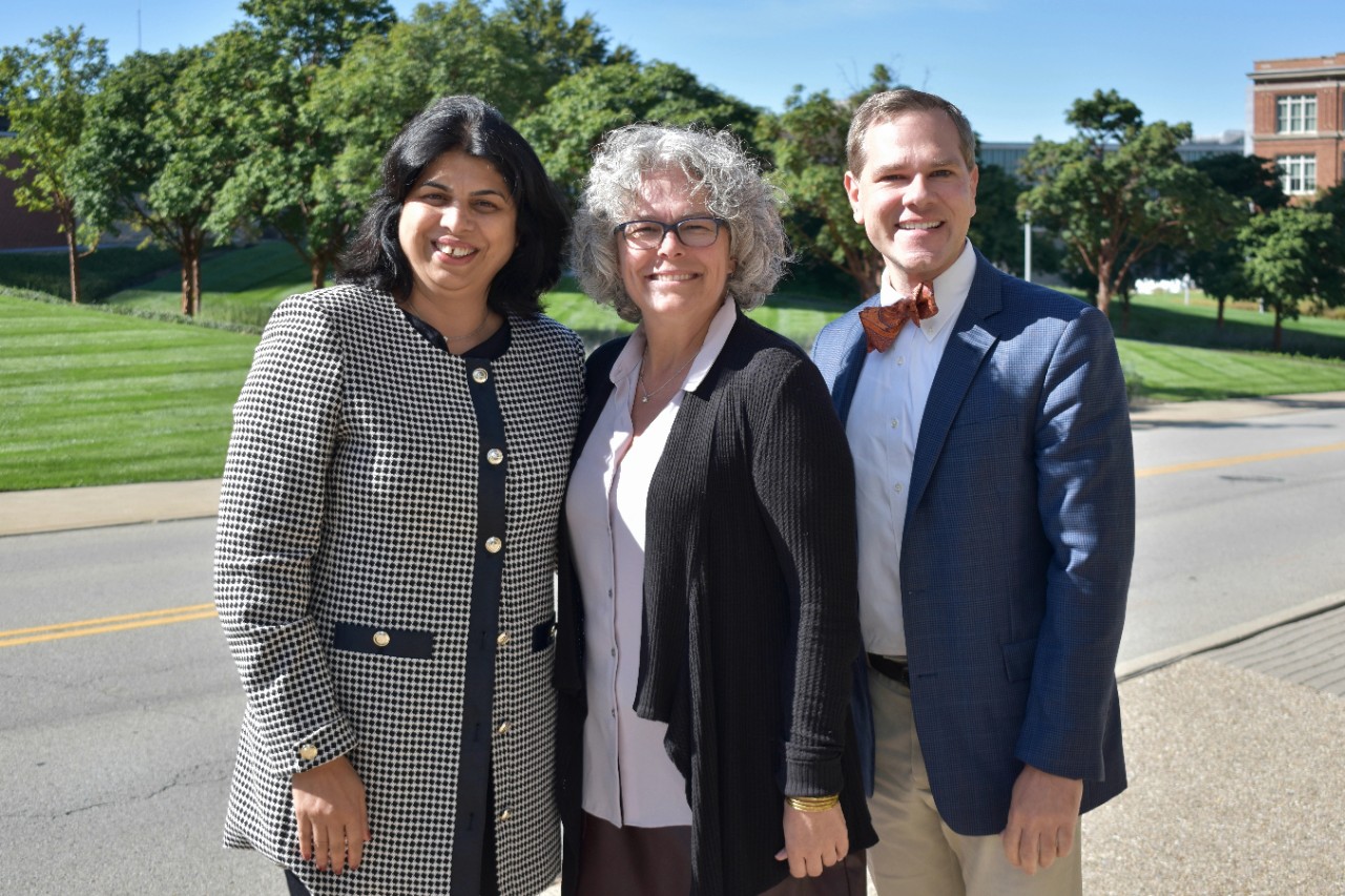The three co-directors of CCTST standing together outdoors