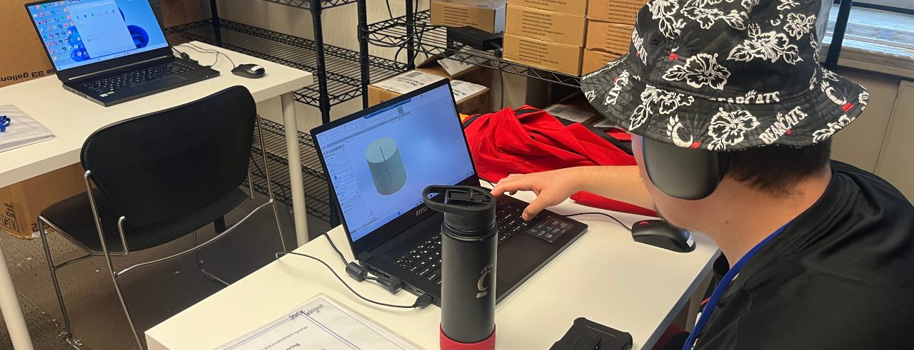 CEES Student working on computer for 3D printing