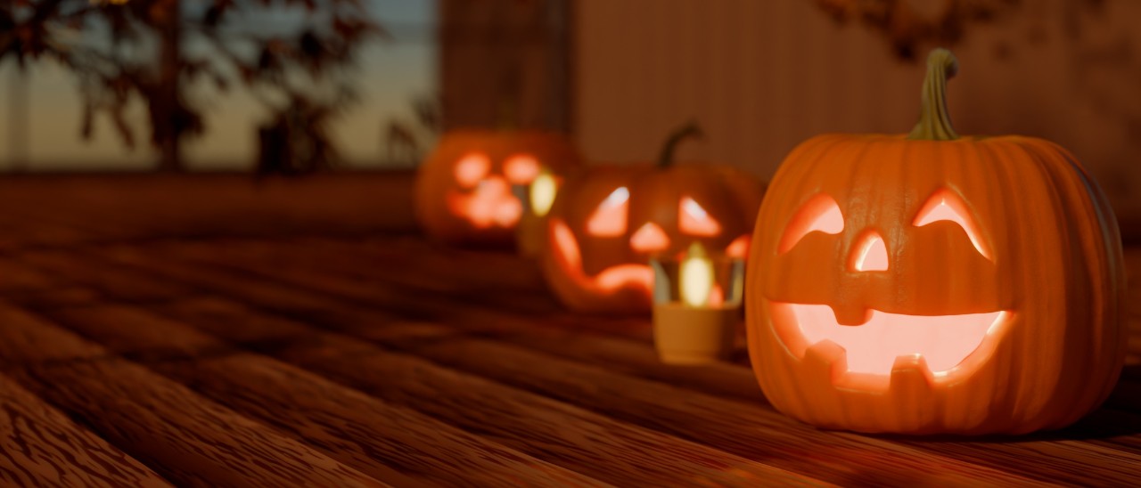carved pumpkins on a porche