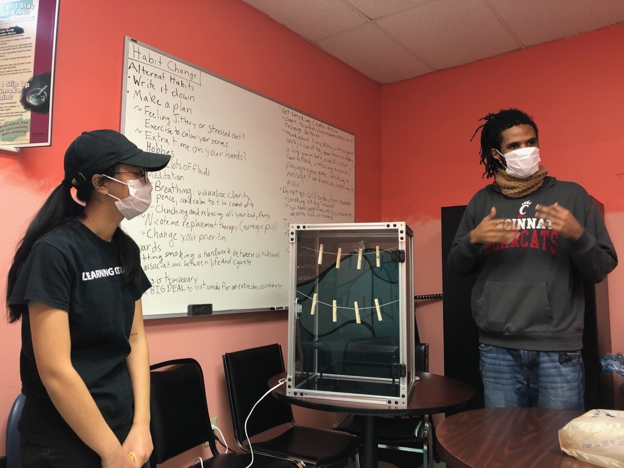 UC engineering students, Allison-Joy Garbo and Kellen Crosby are shown with their UV box known as Dis-Box.