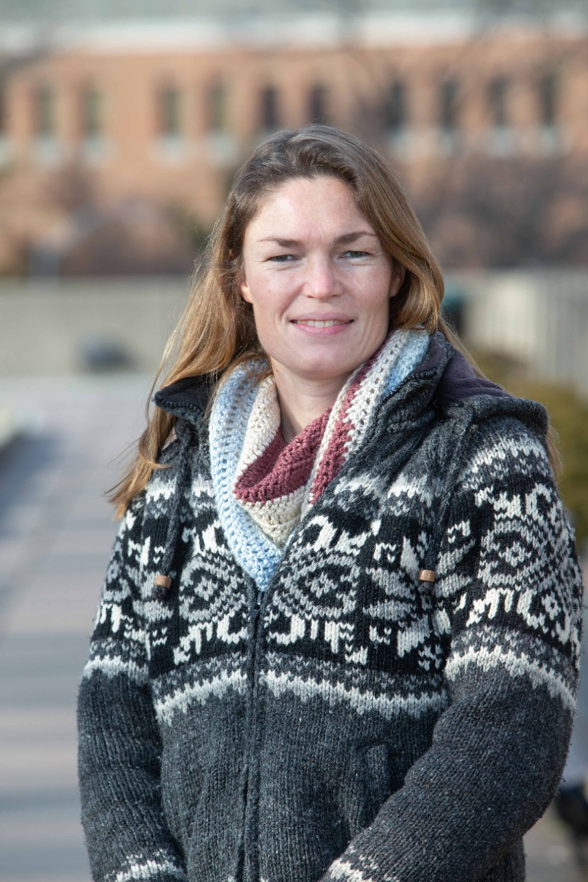 UC biology professor Elizabeth Hobson and UC postdoctoral researcher Annemarie Van Der Marel (shown here with 2 other students) have a new study on monk parakeets. They came up with a better way to code animal behaviors while conducting animal behavior studies.