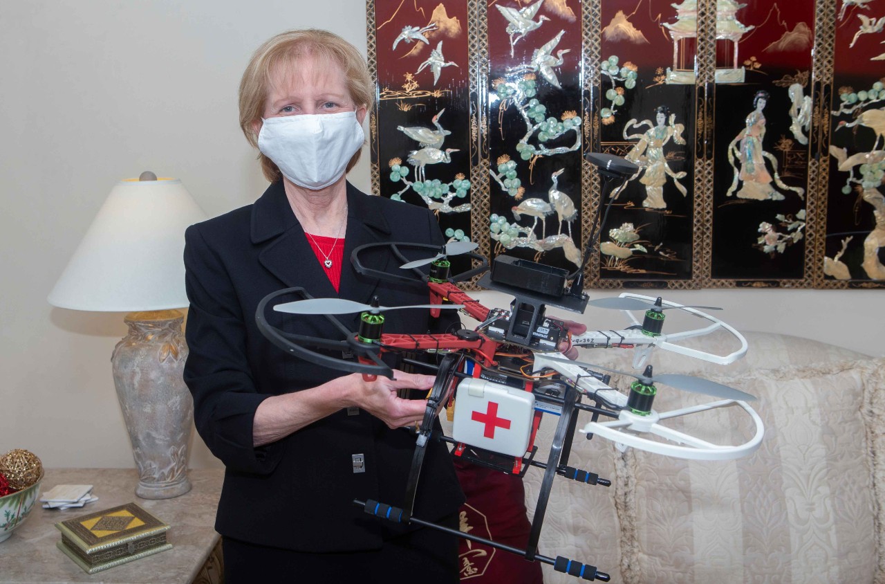 Dr. Debi Sampsel, DNP held the Drone at her home in West Chester. UC/ Joseph Fuqua II