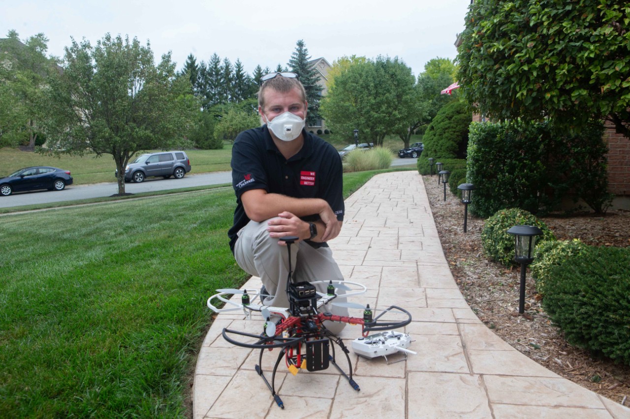 UC student James (Zach) Wells operated the Drone as he flew it to the front door of Dr. Sampsel home in West Chester. UC/ Joseph Fuqua II
