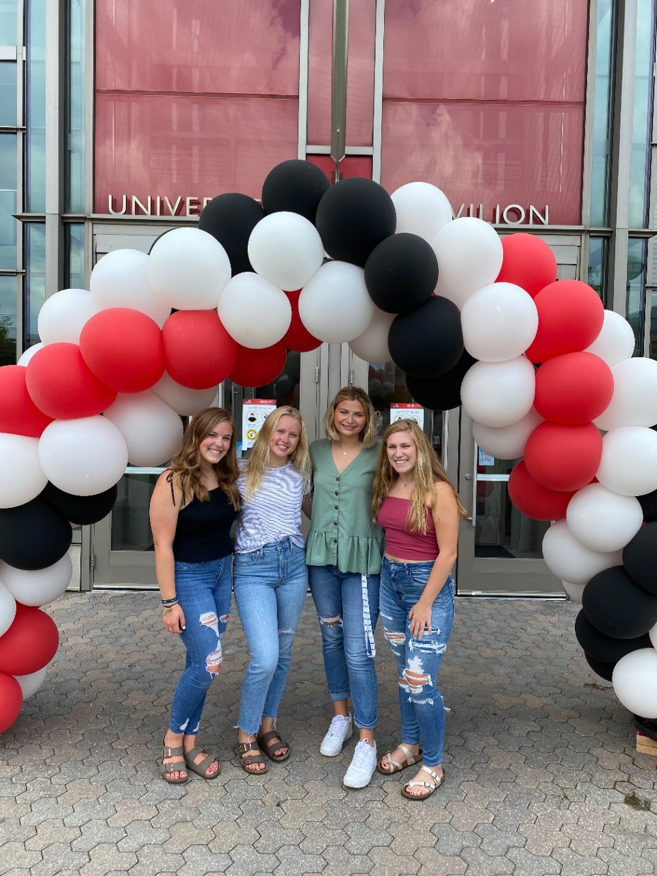 Group of friends in front of University Pavilion