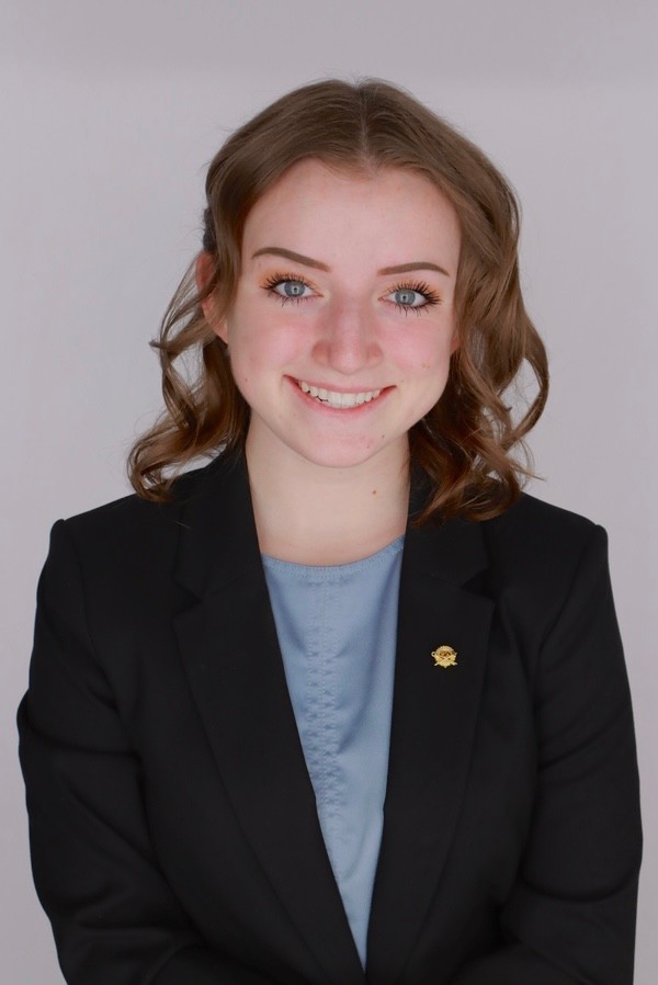 Headshot of By: Bailey Freeland