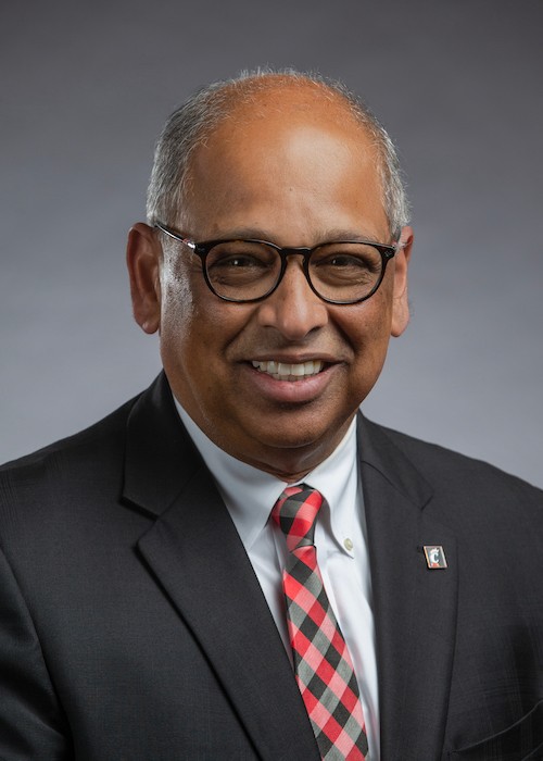 Accessories,  Accessory,  Apparel,  Clothing,  Coat,  Human,  Overcoat,  Person,  Suit,  Tie
Office of the President staff and student employee portraits