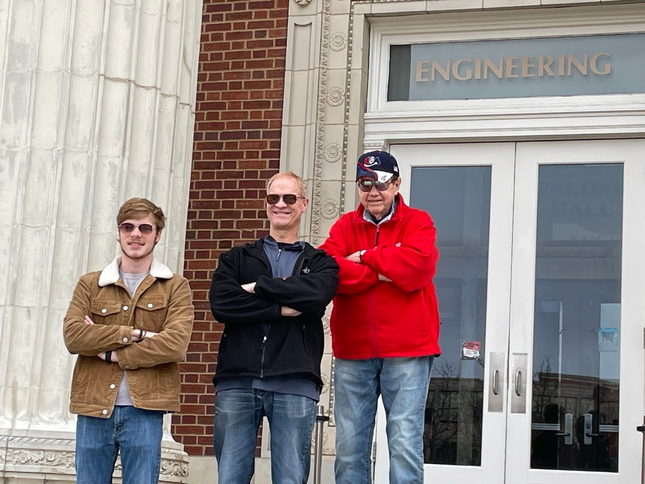 Matt Smeal with his father and grandfather outside of Baldwin Hall. Photo/provided.
