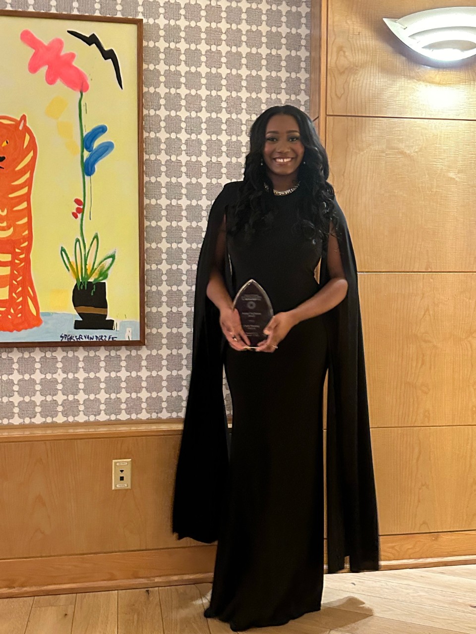 Corin Manning holds the Student Trailblazer Award from the 2024 Onyx & Ruby Gala Feb. 17.
