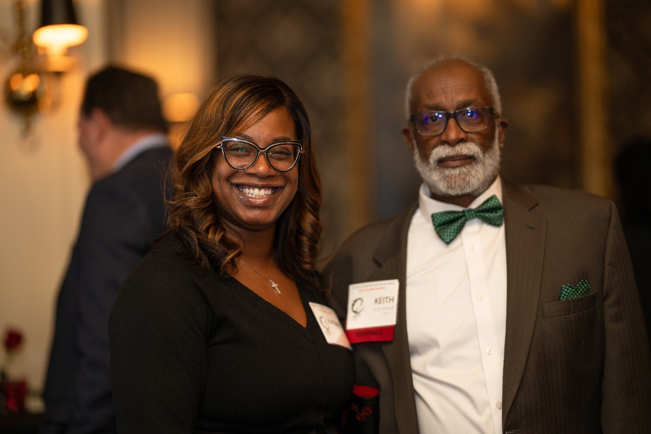 Whitney Gaskins and Keith Boswell smile at the camera.
