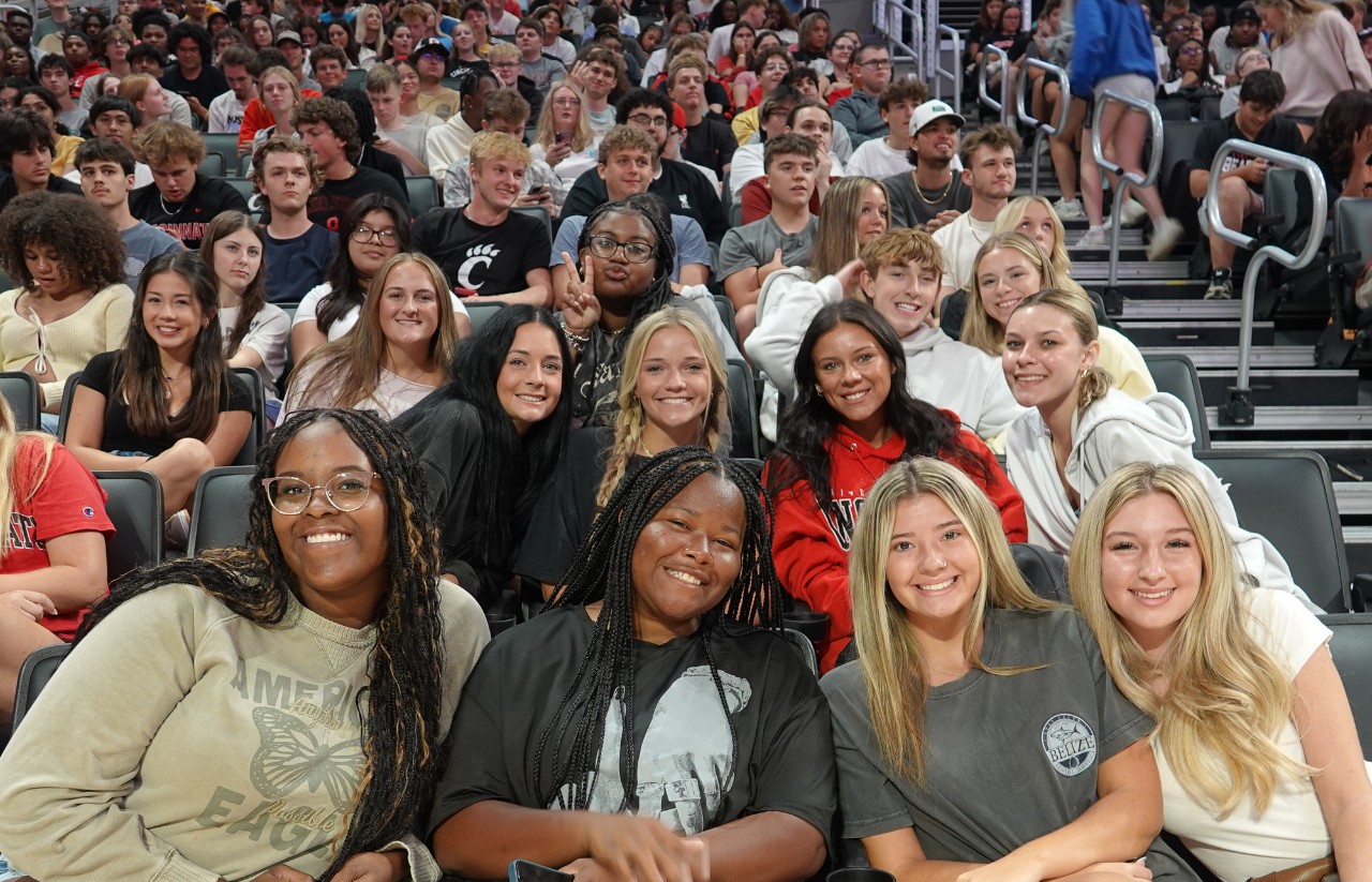 Students pose for a photo from their seats in Fifth Third Arena.
