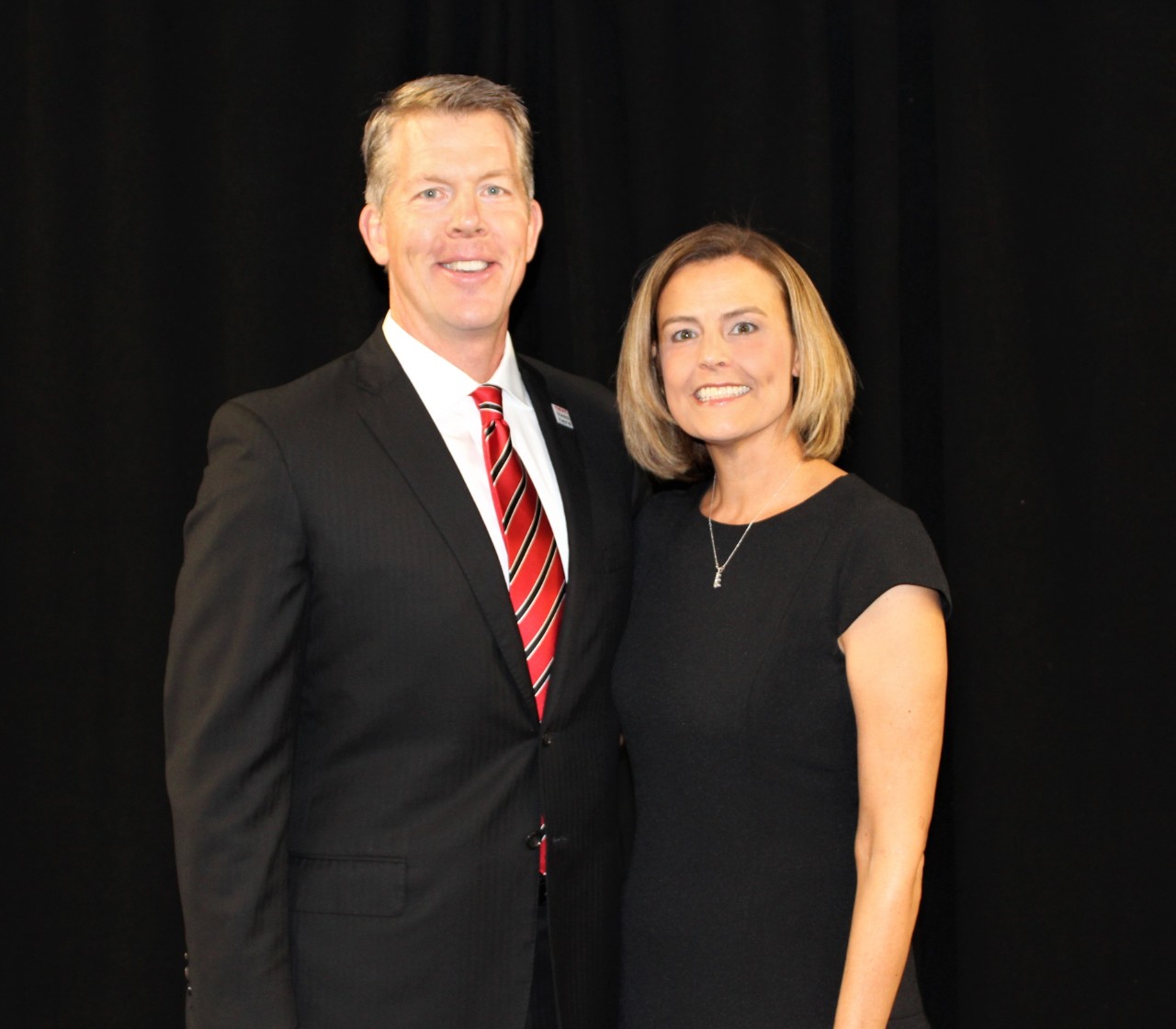 Greg with wife, Christie Wolf.