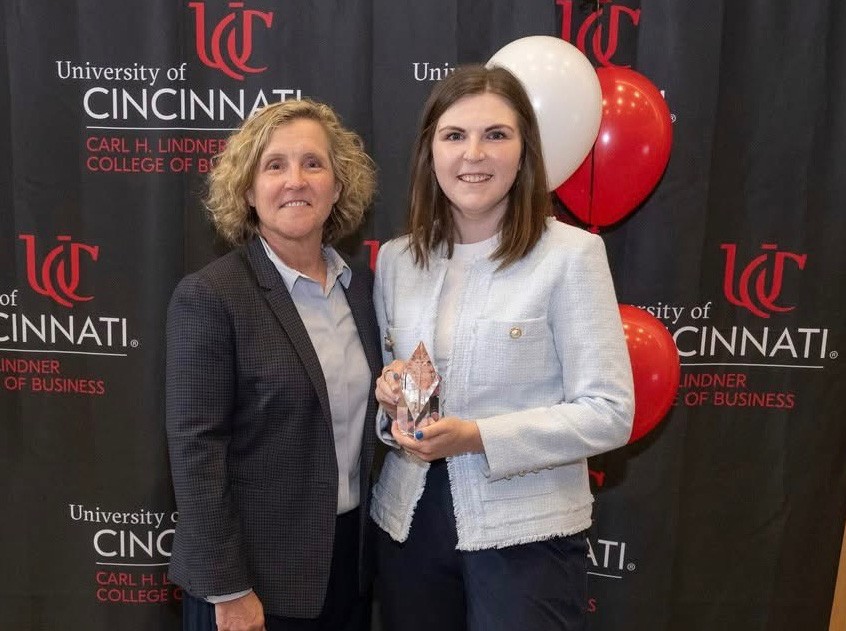 Erica Neff poses with Lindner College of Business Dean Marianne Lewis